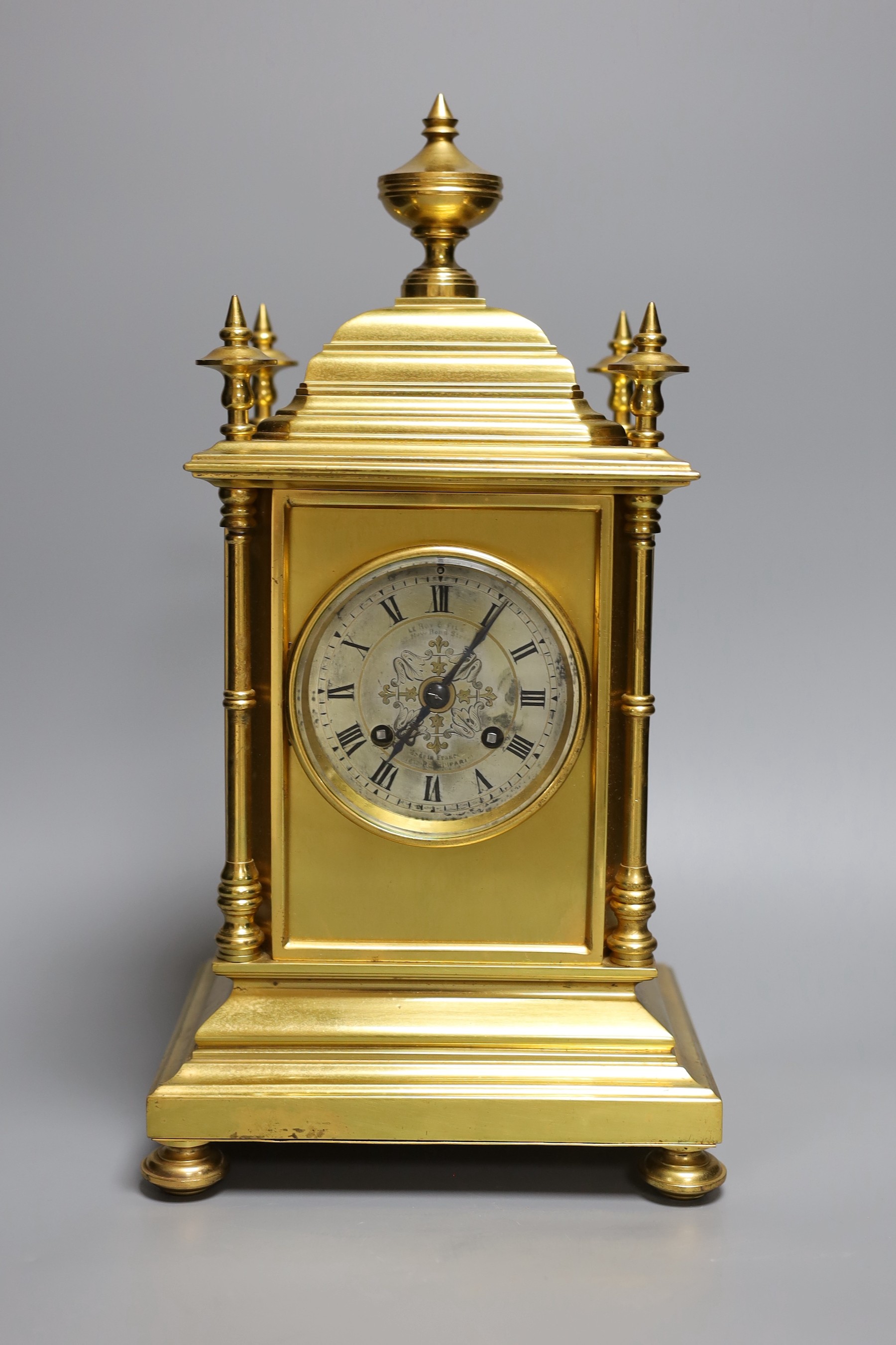 A Le Roy et Fils architectural brass mantel clock, with pendulum and key, 37cm tall